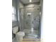 Modern bathroom with a large walk-in shower and marble tile at 305 General As Johnston St, Stanley, NC 28164