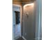 Hallway with light wall and barn door leading to bathroom at 305 General As Johnston St, Stanley, NC 28164