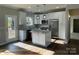 Modern kitchen with white cabinets and granite countertops at 305 General As Johnston St, Stanley, NC 28164