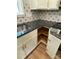 Kitchen with stainless steel sink, granite countertops, and corner shelves at 305 General As Johnston St, Stanley, NC 28164