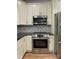 Modern kitchen featuring stainless steel appliances and sleek countertops at 305 General As Johnston St, Stanley, NC 28164