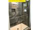 Large walk-in shower with grey marble tile and glass enclosure at 305 General As Johnston St, Stanley, NC 28164