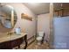 Unfinished basement bathroom with toilet and sink at 327 S Grove St, Lincolnton, NC 28092