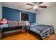 Bedroom with a full-size bed and built-in bunk bed at 327 S Grove St, Lincolnton, NC 28092