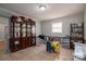 Bright dining room with hutch and play area at 327 S Grove St, Lincolnton, NC 28092