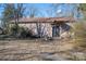 Detached building with metal roof; potential workshop or storage at 327 S Grove St, Lincolnton, NC 28092