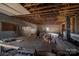 Unfinished interior with exposed wooden beams and flooring at 327 S Grove St, Lincolnton, NC 28092