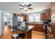 Kitchen with an island, granite countertops, and wood cabinets at 327 S Grove St, Lincolnton, NC 28092