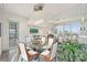 Modern dining room with glass-top table and city views at 333 W Trade St # 1204, Charlotte, NC 28202