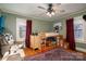 Light-filled bedroom with a bunk bed and wood dresser at 3513 Startown Rd, Newton, NC 28658