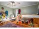 bedroom with a bunk bed, toys, and ample storage space at 3513 Startown Rd, Newton, NC 28658