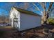 White detached garage with two garage doors at 3513 Startown Rd, Newton, NC 28658