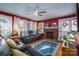 Living room with fireplace, hardwood floors, and comfortable seating at 3513 Startown Rd, Newton, NC 28658