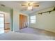 Light and airy bedroom with ceiling fan and closet at 44101 Millingport Rd, Richfield, NC 28137