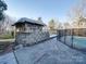 Wooden pool bar with thatched roof at 44101 Millingport Rd, Richfield, NC 28137