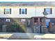 Front view of townhouse with brick and siding exterior at 4618 Old Lantern Way, Charlotte, NC 28212