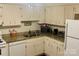 Kitchen with white cabinets and granite countertops at 4618 Old Lantern Way, Charlotte, NC 28212