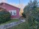 Side view of the house showcasing a walkway and landscaping at 518 Joe Louis St, Fort Mill, SC 29715