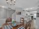 Well-lit dining area next to kitchen and stairs at 6012 Sapwood Ct, Matthews, NC 28104