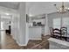 Open concept kitchen and dining area with hardwood floors at 6012 Sapwood Ct, Matthews, NC 28104