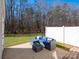 Relaxing patio area with outdoor furniture, backing to a wooded area at 6012 Sapwood Ct, Matthews, NC 28104