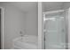 Bathroom with bathtub and shower at 709 Ferrell Ave, Charlotte, NC 28216