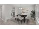 Dining room with a table, chairs, and kitchen view at 709 Ferrell Ave, Charlotte, NC 28216