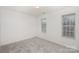 Simple bedroom with neutral walls and carpet at 9005 Jaldena Dr, Charlotte, NC 28227