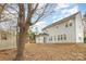 Two-story house with gray siding and backyard view at 9005 Jaldena Dr, Charlotte, NC 28227