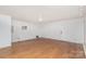 Spacious living room featuring hardwood floors at 9005 Jaldena Dr, Charlotte, NC 28227