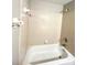 Bathroom with beige tile and a shower/tub combo at 9401 Old Concord Rd # A, Charlotte, NC 28213