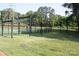 Outdoor fitness area with monkey bars, pull-up bars, and basketball court at 9729 Cockerham Ln, Huntersville, NC 28078