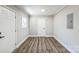 Empty spare bedroom with new flooring and doors at 1106 1/2 N Oakwood St, Gastonia, NC 28052