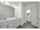Double vanity bathroom with white cabinets at 1108 Verdigris Dr # 802/0802, Gastonia, NC 28054