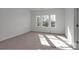 Bright bedroom with three windows and carpet at 1108 Verdigris Dr # 802/0802, Gastonia, NC 28054