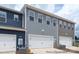 Three townhome garages with different colors at 1108 Verdigris Dr # 802/0802, Gastonia, NC 28054
