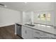 Kitchen with granite countertops, island, and stainless steel appliances at 1108 Verdigris Dr # 802/0802, Gastonia, NC 28054