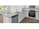 Modern kitchen with granite counters and stainless steel appliances at 1108 Verdigris Dr # 802/0802, Gastonia, NC 28054