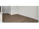 Spacious living area with hardwood floors and door access at 1108 Verdigris Dr # 802/0802, Gastonia, NC 28054