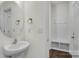 Modern powder room with oval mirror and built-in storage at 1108 Verdigris Dr # 802/0802, Gastonia, NC 28054