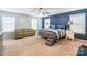 Main bedroom with ceiling fan, blue accent wall, and ample space at 1147 Wagner Ave, Fort Mill, SC 29715