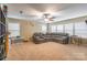 Spacious playroom with sectional sofa and ample storage at 1147 Wagner Ave, Fort Mill, SC 29715