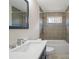 Bathroom showcasing modern tile and tub with shower at 122 Lowry Row, York, SC 29745