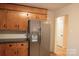 Kitchen features stainless steel appliances, updated cabinets and backsplash at 122 Lowry Row, York, SC 29745