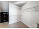 Large walk-in closet with built-in shelving and safe at 12211 Bonny Oaks Dr, Cornelius, NC 28031