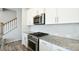 Kitchen with stainless steel appliances and granite countertops at 1229 Kohler Ave, Charlotte, NC 28206