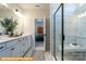 Bathroom with double vanity, a large shower and view into bedroom at 6308 Honor Ave, Midland, NC 28107
