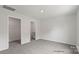 Bedroom with carpet, walk-in closet and private bathroom at 1411 5Th Street Ne Dr, Hickory, NC 28601