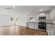 Modern kitchen with stainless steel appliances and hardwood floors at 1411 5Th Street Ne Dr, Hickory, NC 28601