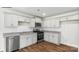 Modern kitchen featuring granite countertops and stainless steel appliances at 1411 5Th Street Ne Dr, Hickory, NC 28601